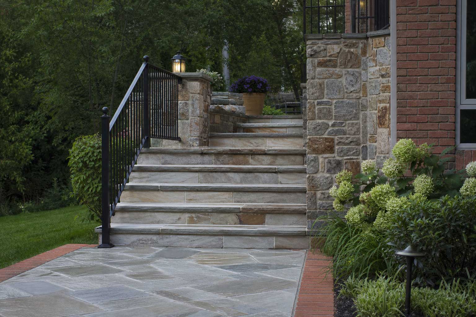 Landscaped garden with stone path and greenery