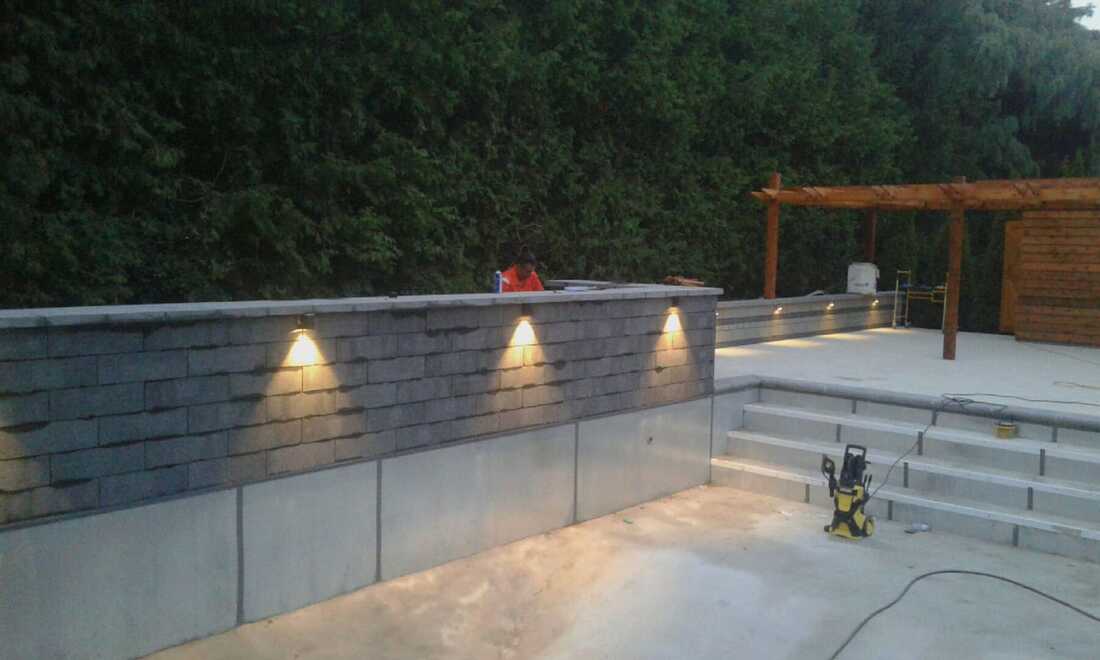 Backyard patio lounge with lighting